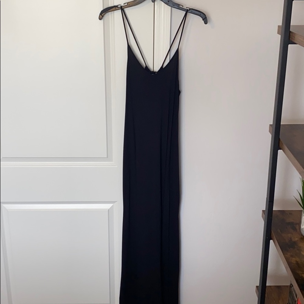 Full length slim fitting black dress
